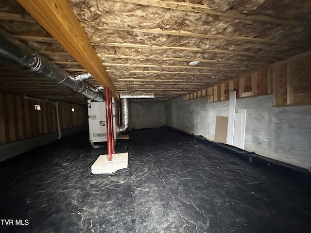 basement featuring heating unit