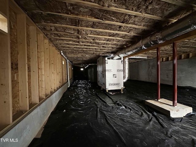 basement featuring heating unit