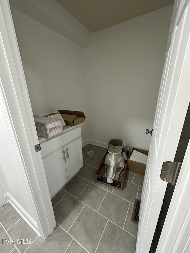 bathroom with tile patterned flooring