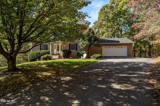 obstructed view of property with a garage