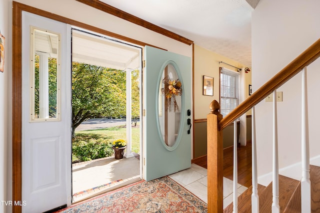 view of tiled foyer entrance