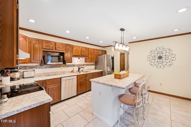 kitchen featuring a kitchen island, hanging light fixtures, stainless steel appliances, backsplash, and sink