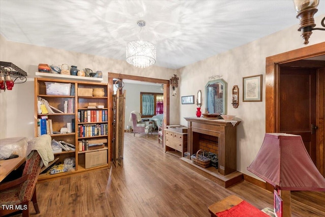 interior space with hardwood / wood-style floors and a chandelier