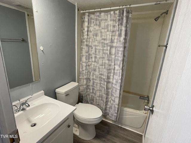 full bathroom with toilet, shower / bath combo, vanity, and wood-type flooring