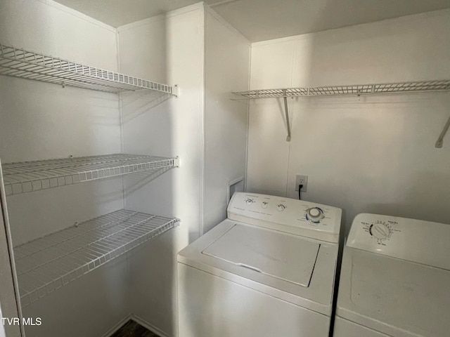 laundry area featuring independent washer and dryer