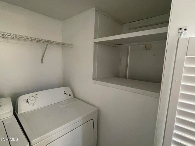 laundry room with washing machine and dryer