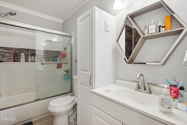 full bathroom with toilet, wood-type flooring, crown molding, vanity, and enclosed tub / shower combo