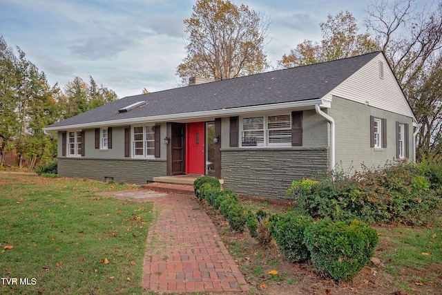 ranch-style home with a front yard