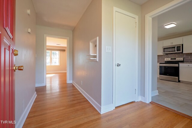 hall featuring light wood-type flooring