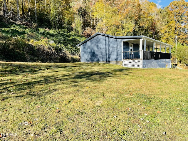 view of outbuilding with a wooded view
