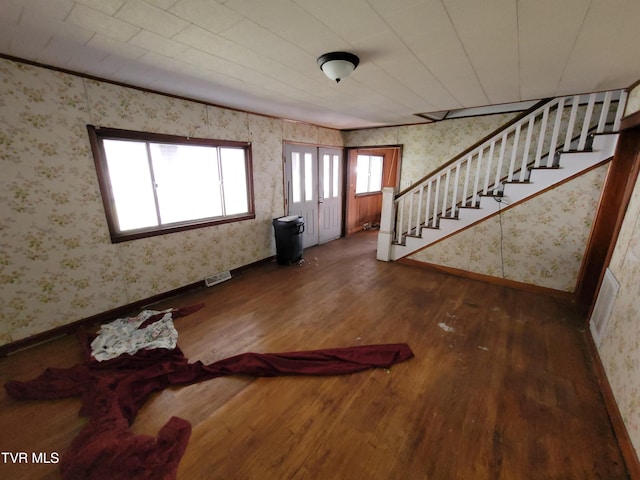 entrance foyer with hardwood / wood-style floors