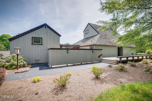 view of home's exterior featuring a deck