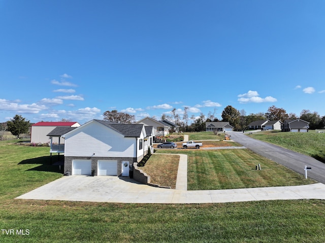 view of side of property with a yard