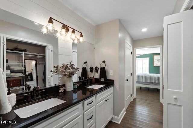 bathroom featuring vanity and wood-type flooring