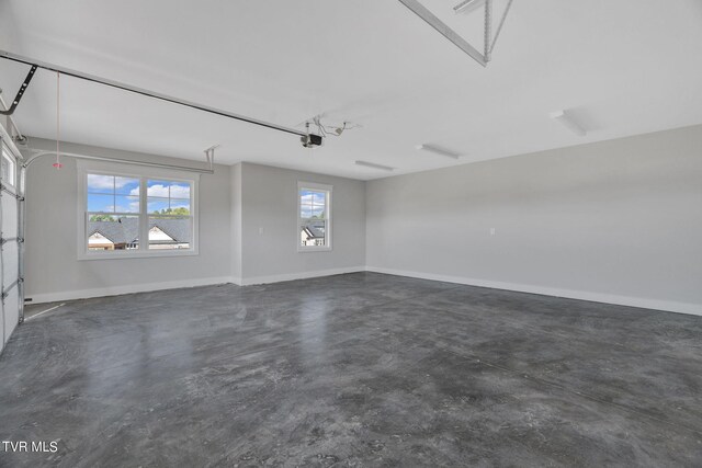 633 Uncle Buddys Way, Jonesborough, TN 37659 - garage featuring baseboards and a garage door opener