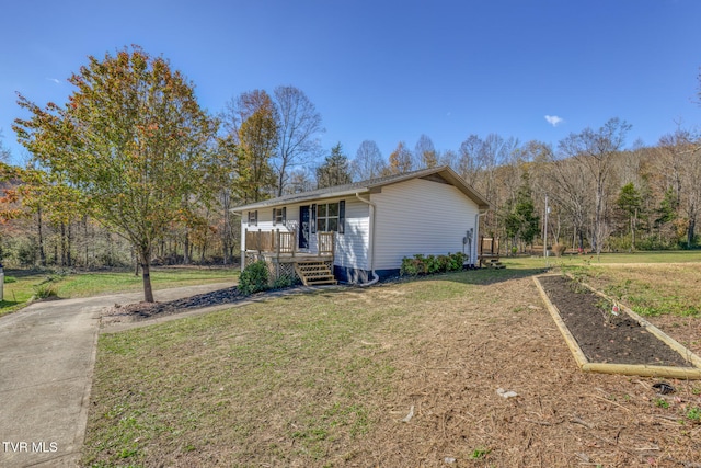 ranch-style house with a front yard