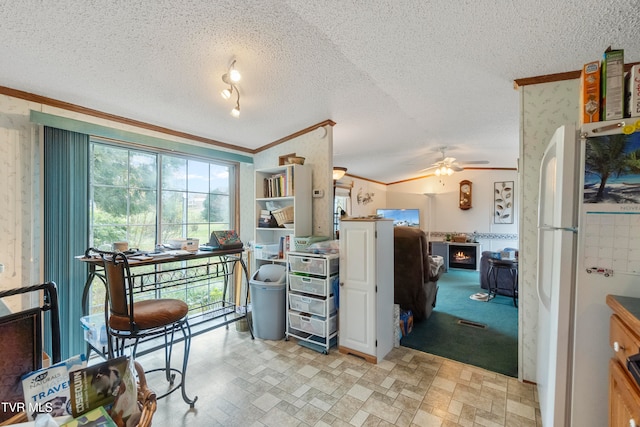 office space featuring crown molding, a textured ceiling, light colored carpet, and ceiling fan