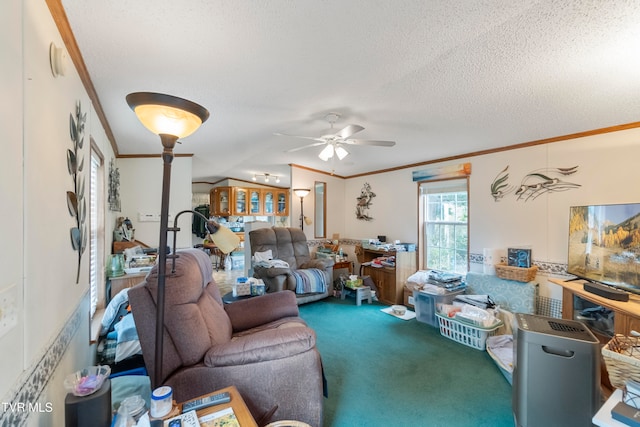 living room featuring carpet floors, crown molding, vaulted ceiling, a textured ceiling, and ceiling fan