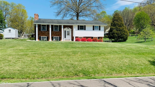 bi-level home with a front yard