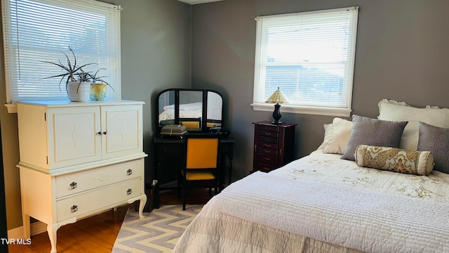 bedroom with hardwood / wood-style floors