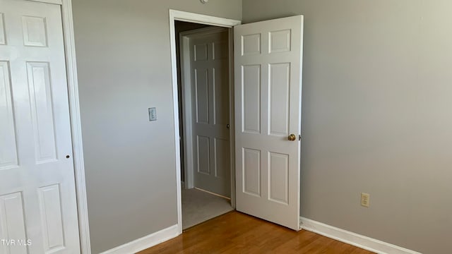 hall featuring hardwood / wood-style flooring