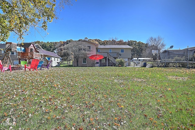 view of yard featuring a trampoline