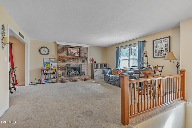 carpeted living room with a textured ceiling and a brick fireplace