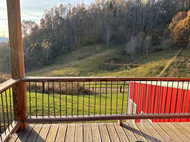 wooden deck with a yard