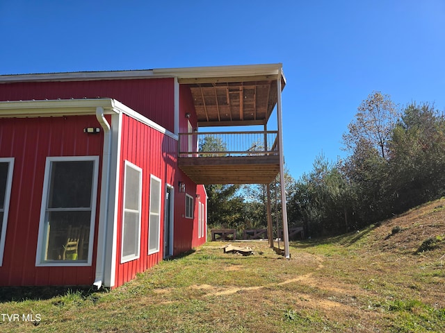 view of home's exterior featuring a lawn