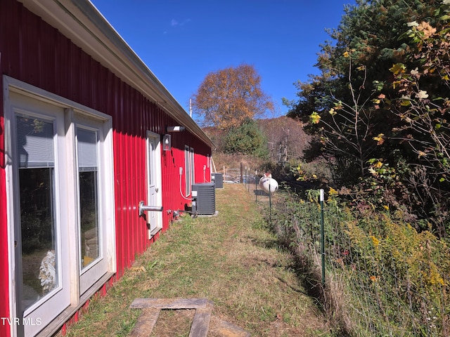 view of yard featuring central AC