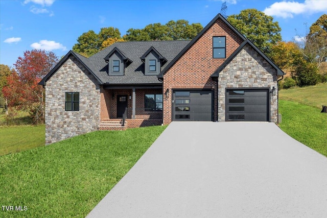 view of front facade featuring a front lawn and a garage