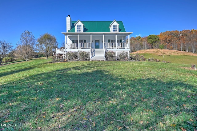 view of front of property with covered porch and a front yard