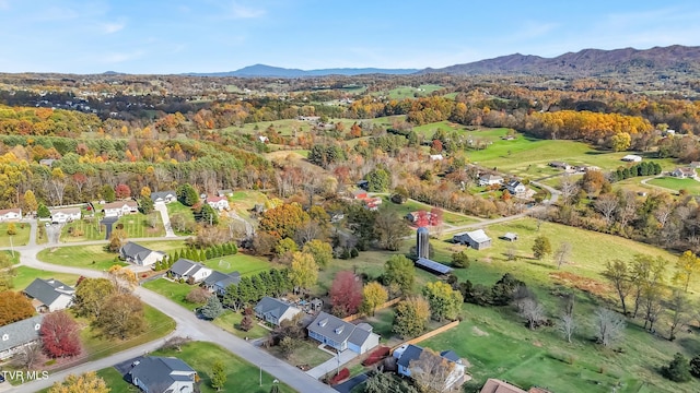 drone / aerial view featuring a mountain view