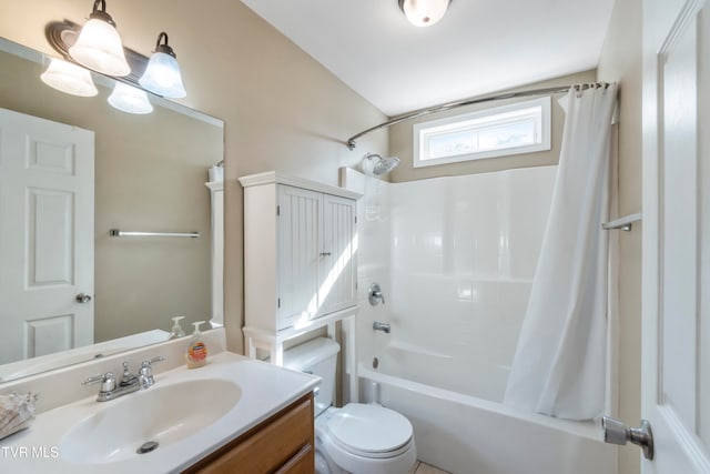 full bathroom with vanity, vaulted ceiling, shower / bath combo with shower curtain, and toilet