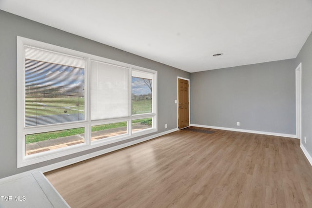 empty room featuring light hardwood / wood-style floors