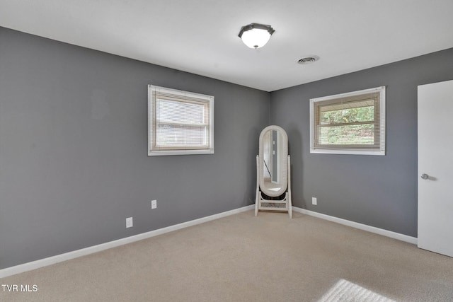 empty room with carpet floors