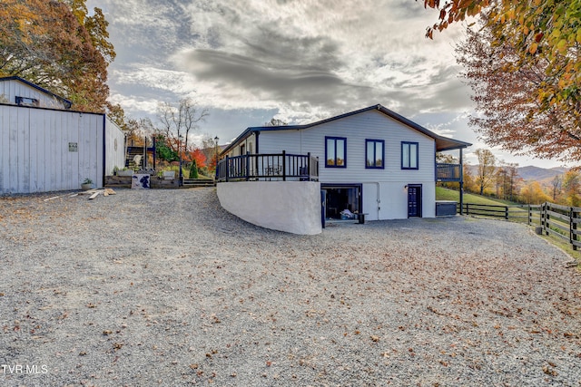 rear view of house with a mountain view