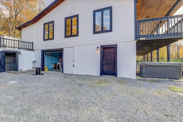 rear view of property with a deck