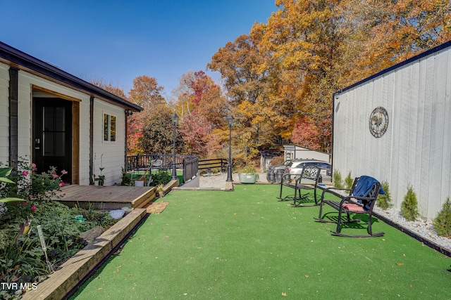 view of yard featuring a deck