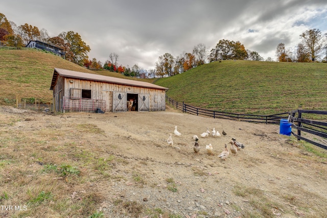 exterior space with a rural view