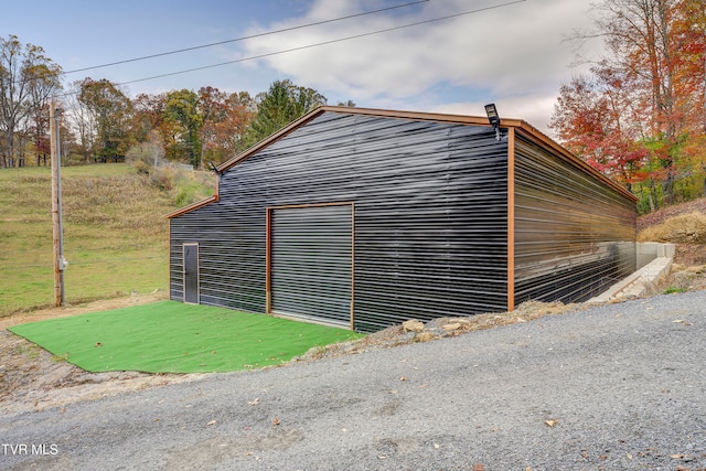 garage with a yard