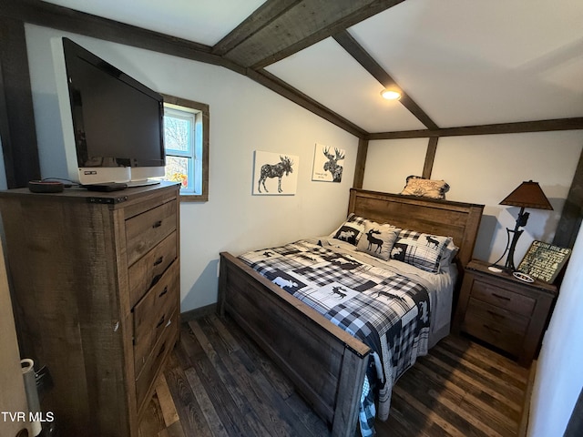 bedroom with dark hardwood / wood-style floors and vaulted ceiling