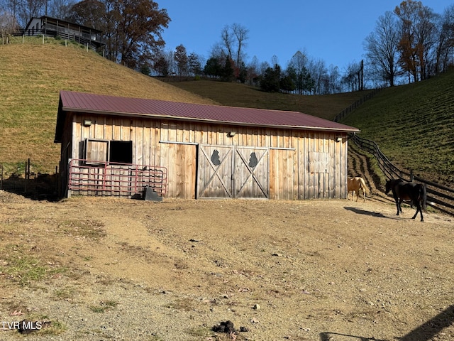 view of outdoor structure featuring a rural view