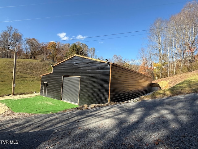 garage with a lawn