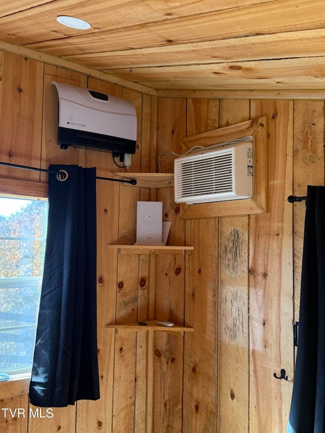 details featuring wood ceiling, wood walls, and an AC wall unit