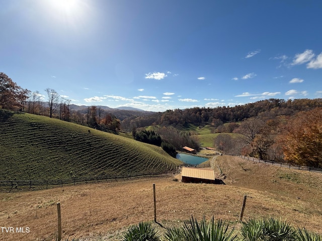 view of mountain feature featuring a rural view