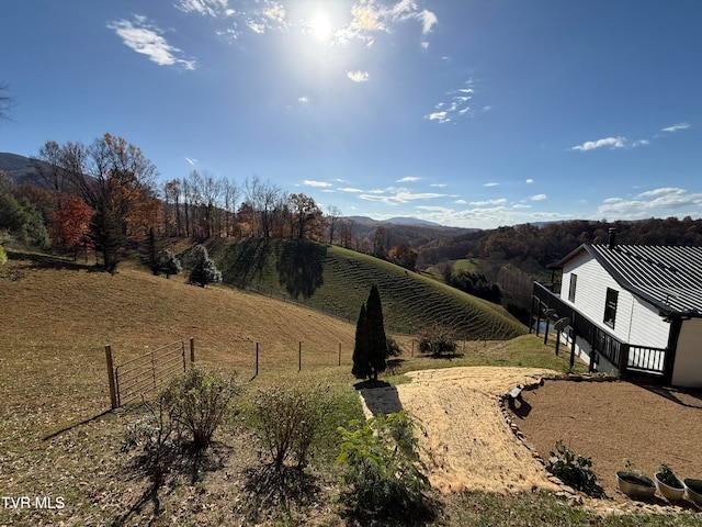 view of mountain feature with a rural view