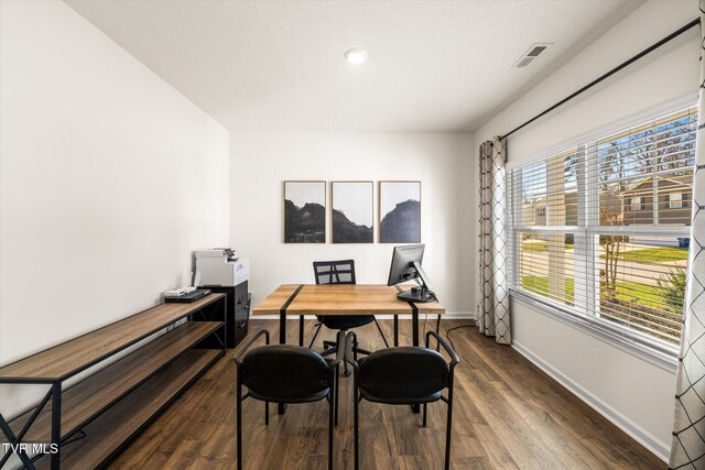 office space featuring dark wood-type flooring