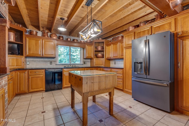 kitchen featuring light tile patterned flooring, stainless steel refrigerator with ice dispenser, black dishwasher, and sink