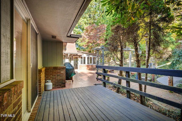 deck featuring grilling area